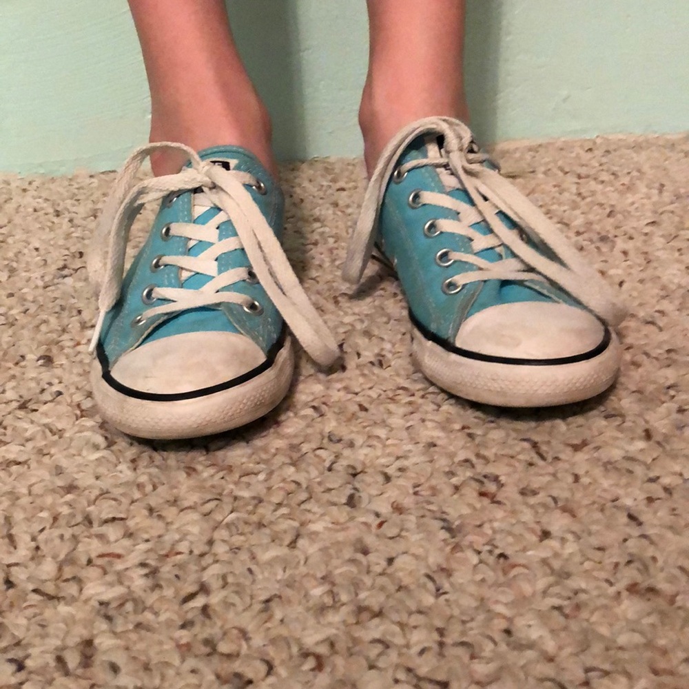 Slightly worn sky blue converse